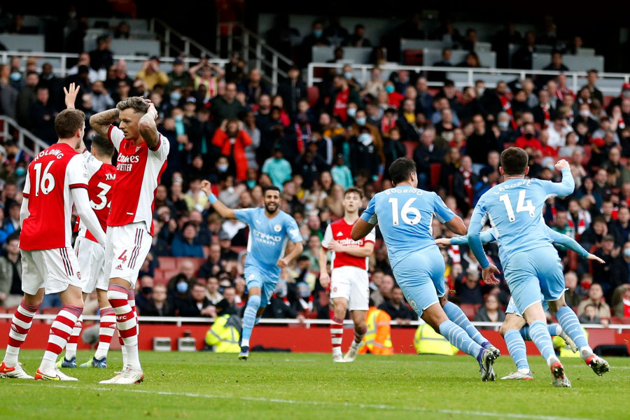 Premier League: City assomme Arsenal sur le fil et creuse son avance