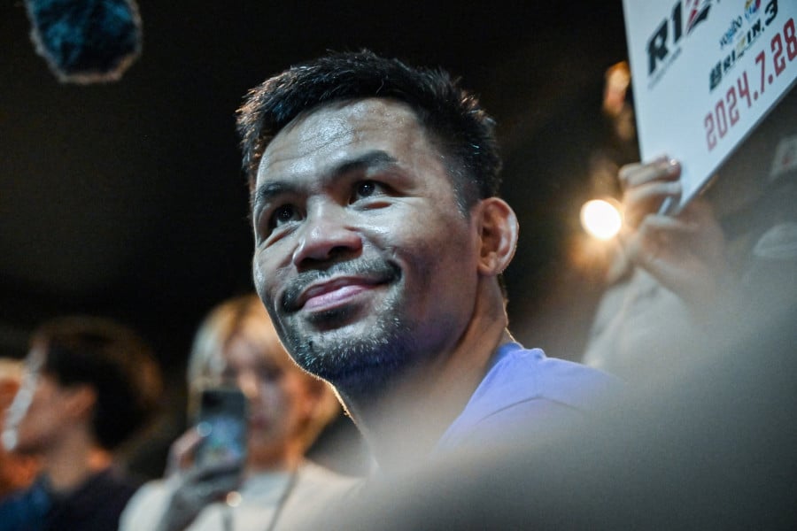 Boxe: Pacquiao vers un combat titre mondial en jeu en juillet