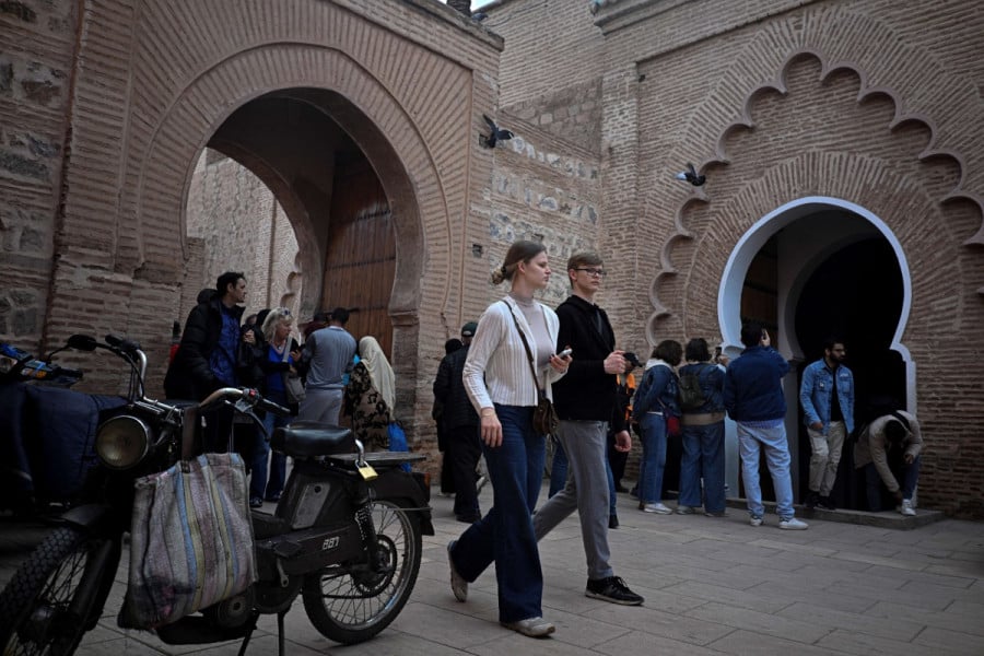Touriste سياحة