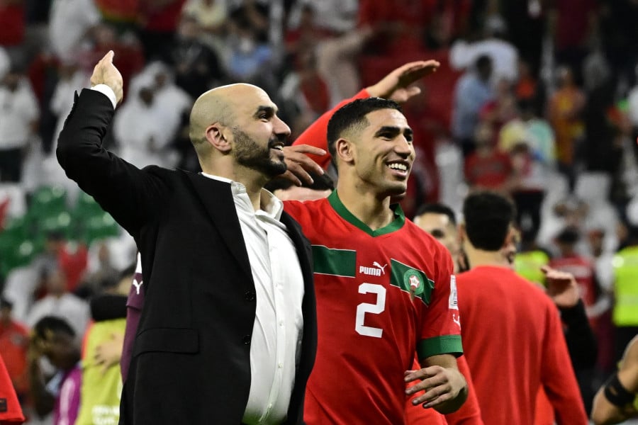 Walid Regragui+ Achraf Hakimi