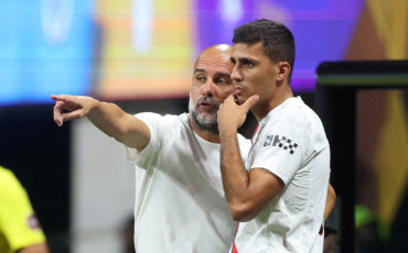 Pep Guardiola and Rodri