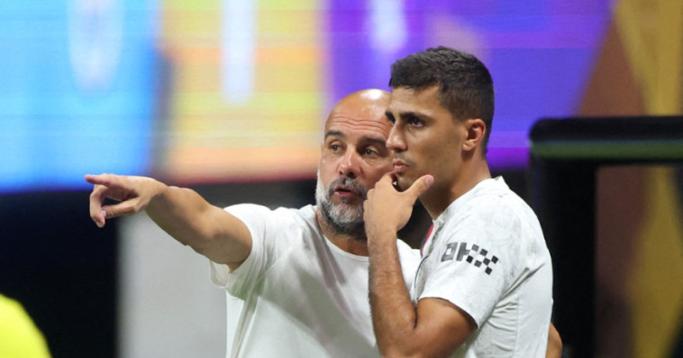 Pep Guardiola and Rodri